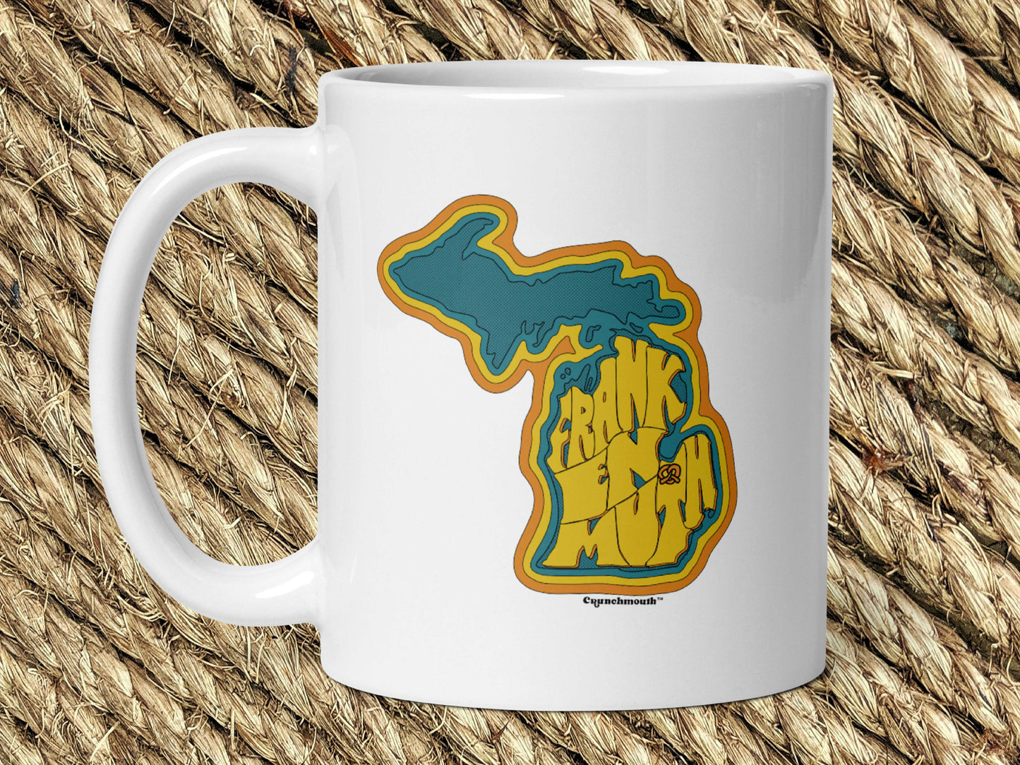 frankenmuth michigan coffee mug, 11oz, handle on left, woven rug background