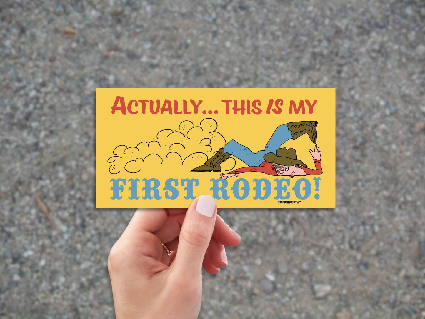 actually this is my first rodeo bumper sticker, hand display, gravel road background