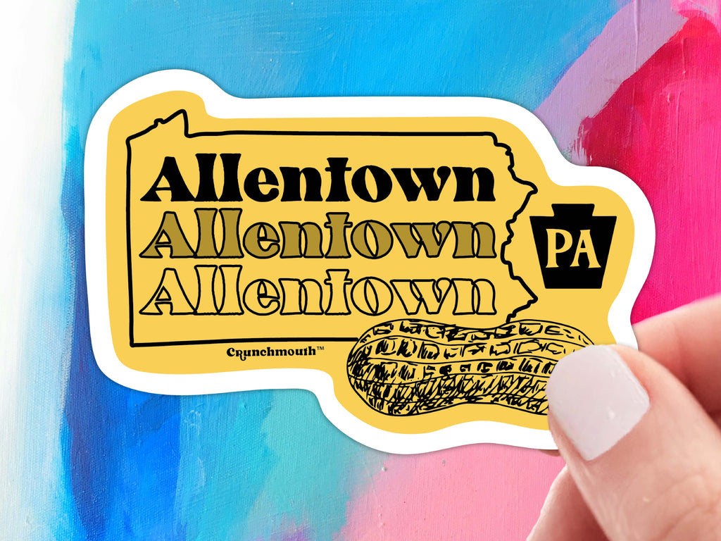 allentown pennsylvania peanut city vinyl sticker, held in hand, colorful paint background