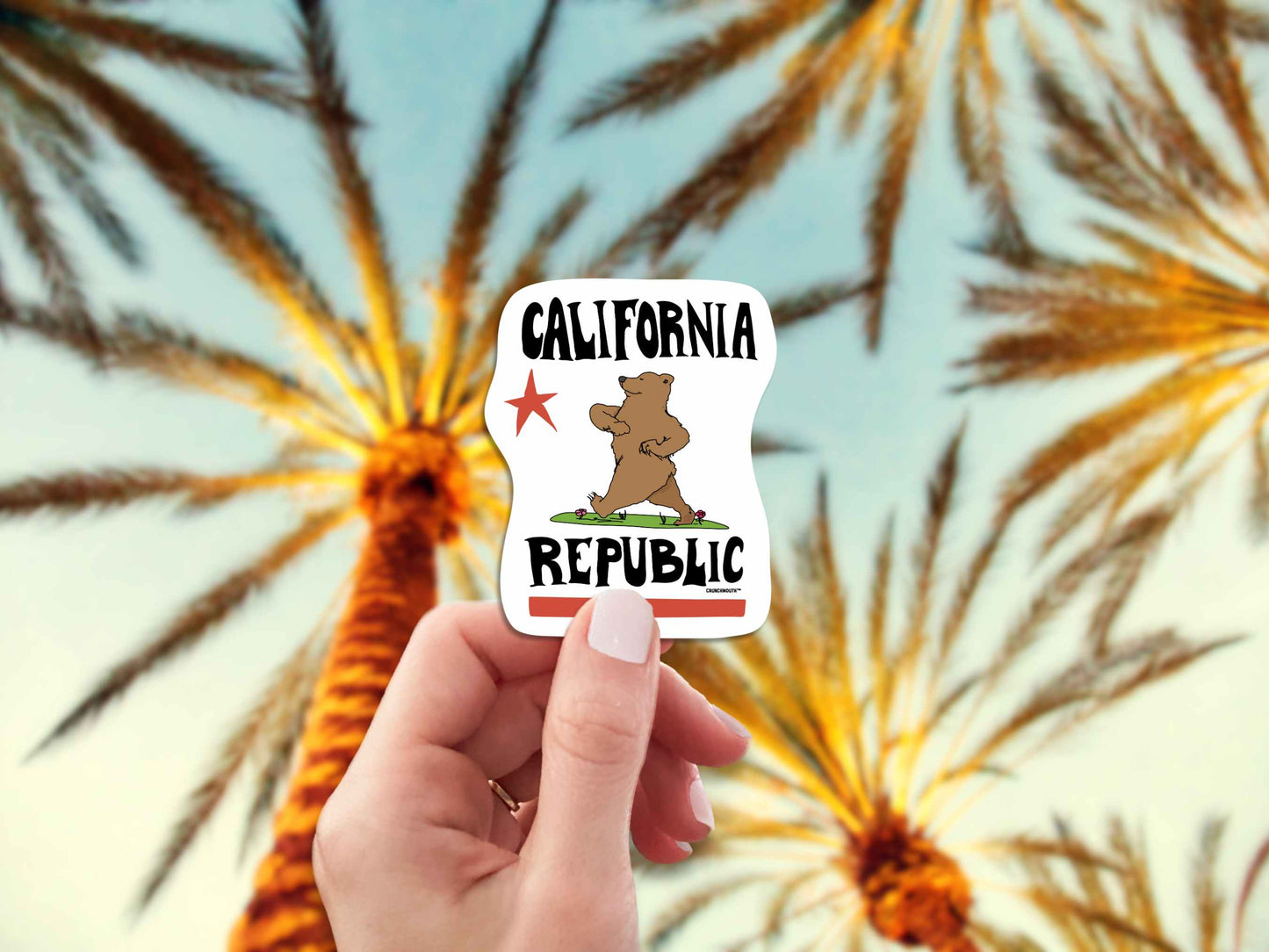 california republic bear travel luggage sticker, hand display, palm trees background