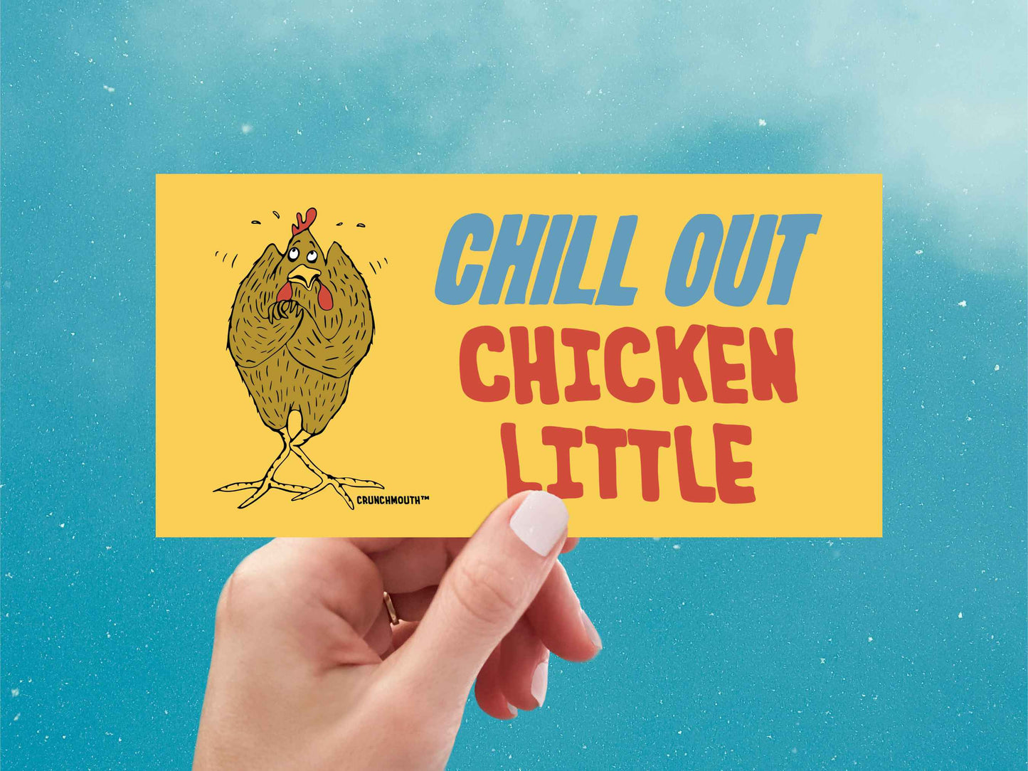 chill out chicken little bumper sticker, hand display, blue sky background