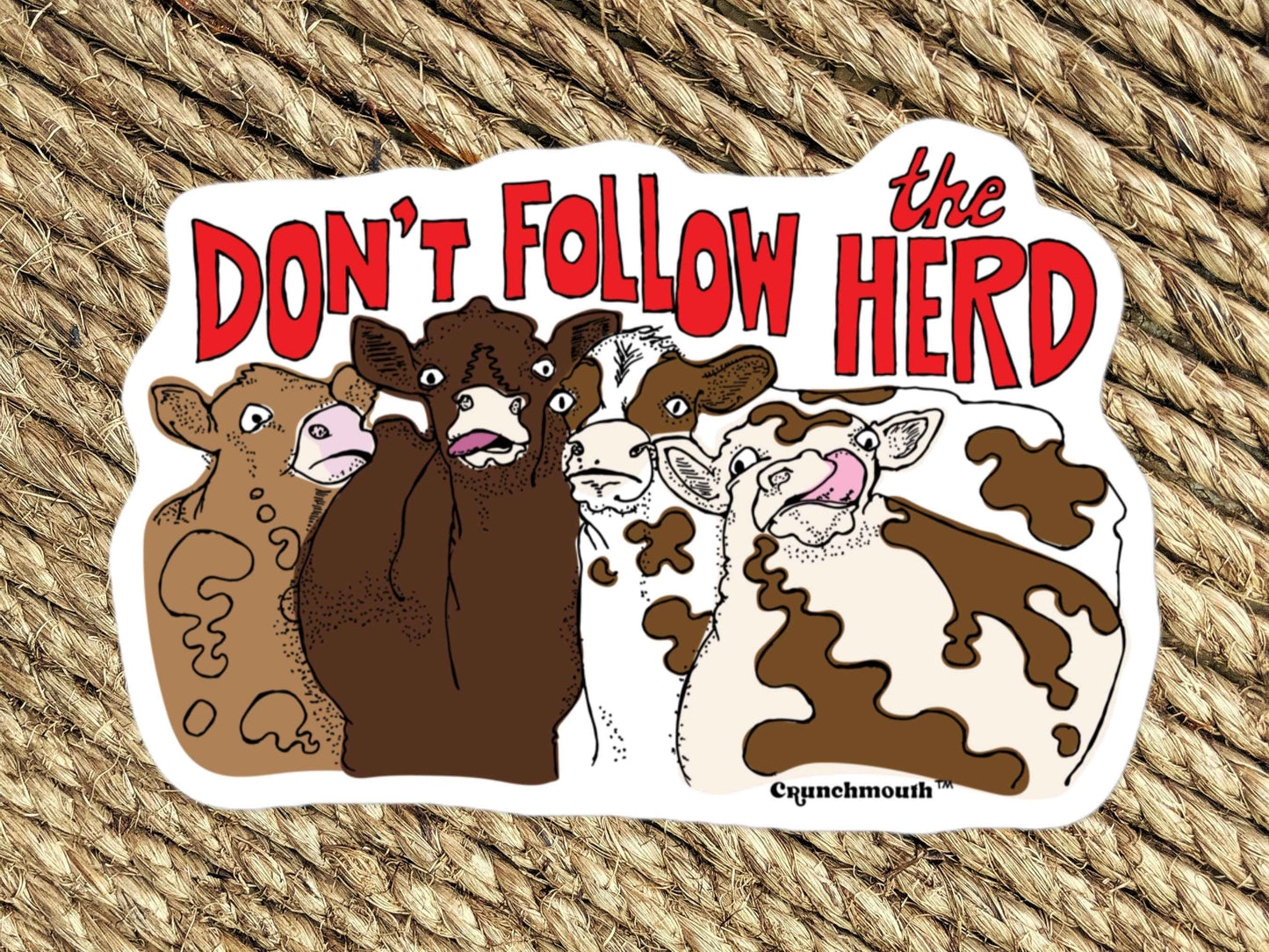 cow sticker, cow sticking tongue out, brown woven rug background