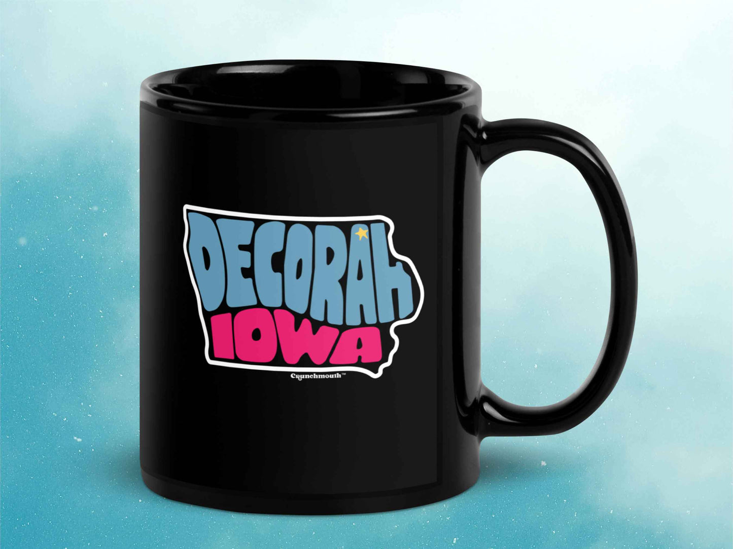 decorah mug, souvenir coffee mugs, 11oz, black ceramic, handle on right, blue sky background