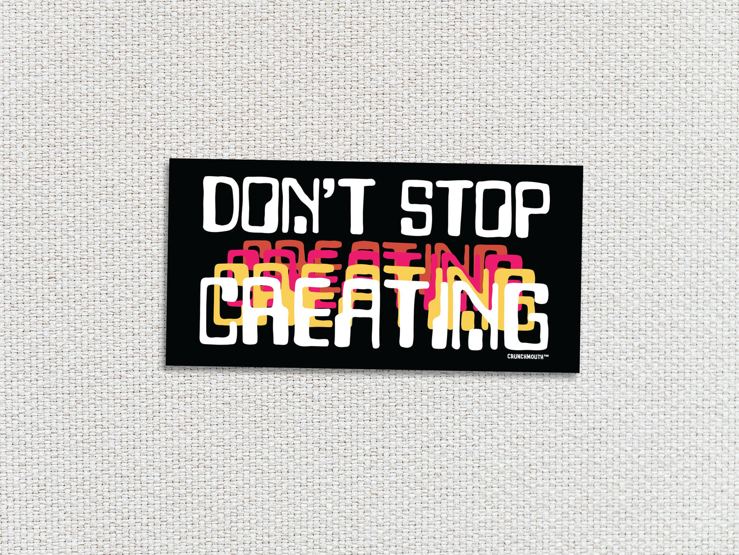 don't stop creating bumper sticker, white textured background