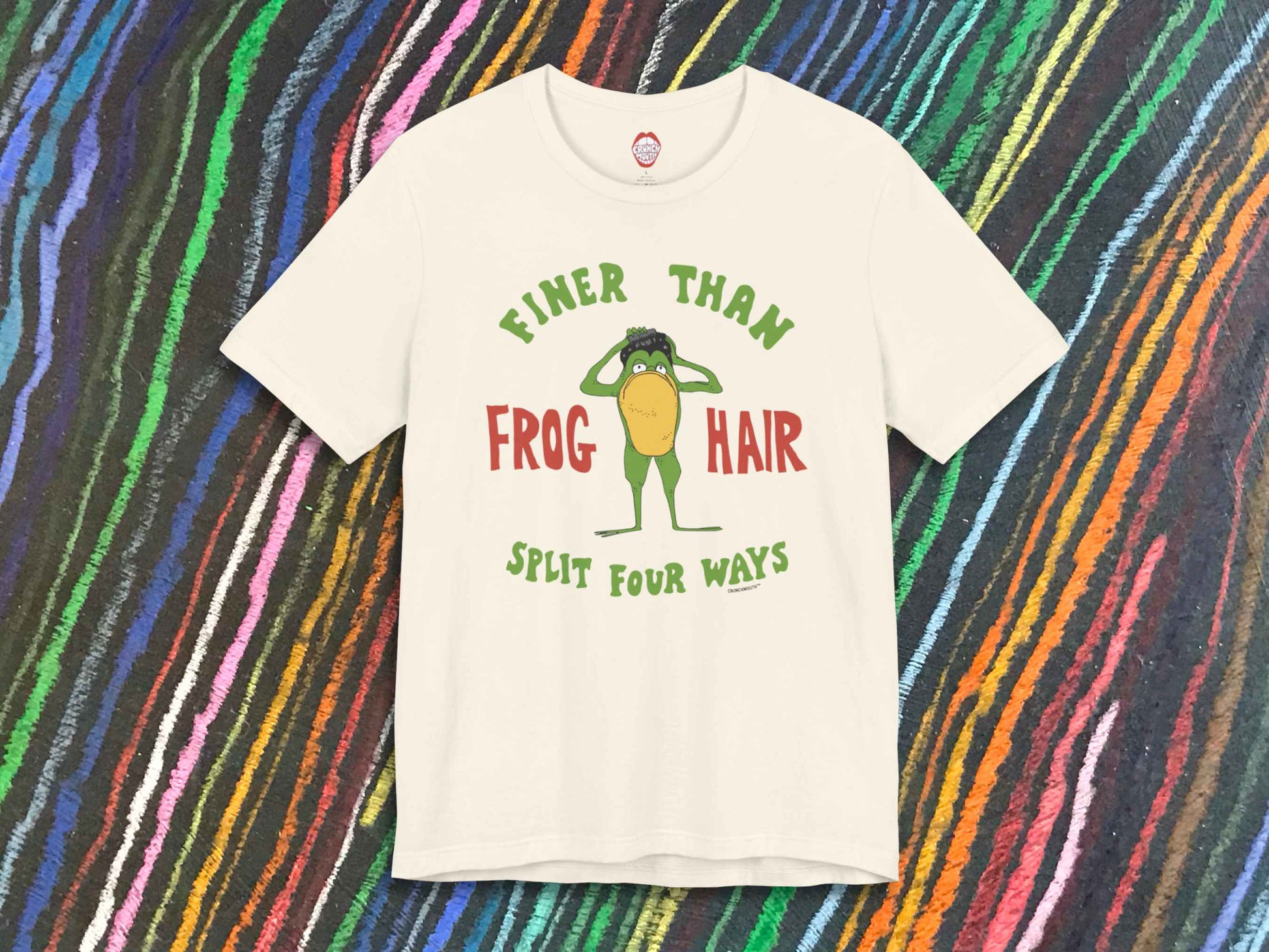 finer than frog hair split four ways shirt, front, colorful crayon stripes on black paper background