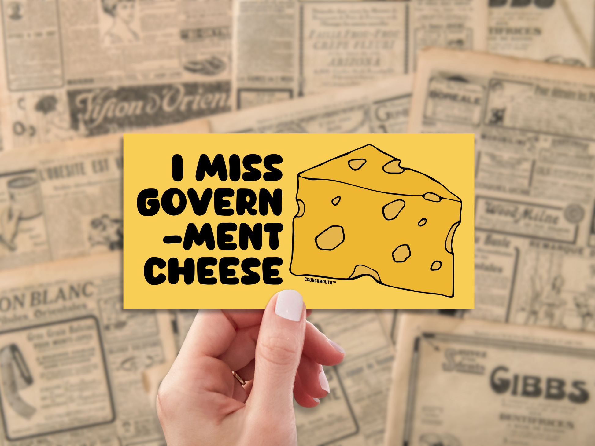 i miss government cheese bumper sticker, hand display, antique newspaper background