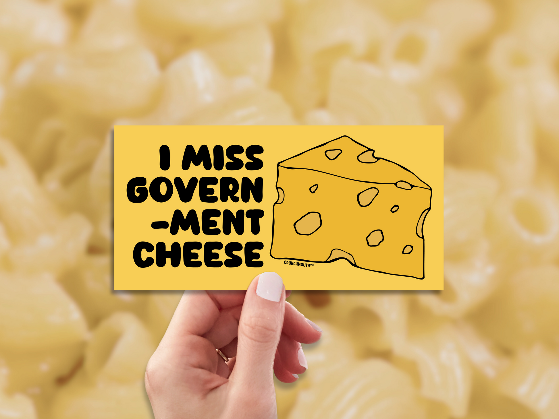 i miss government cheese bumper sticker, hand display, mac and cheese background
