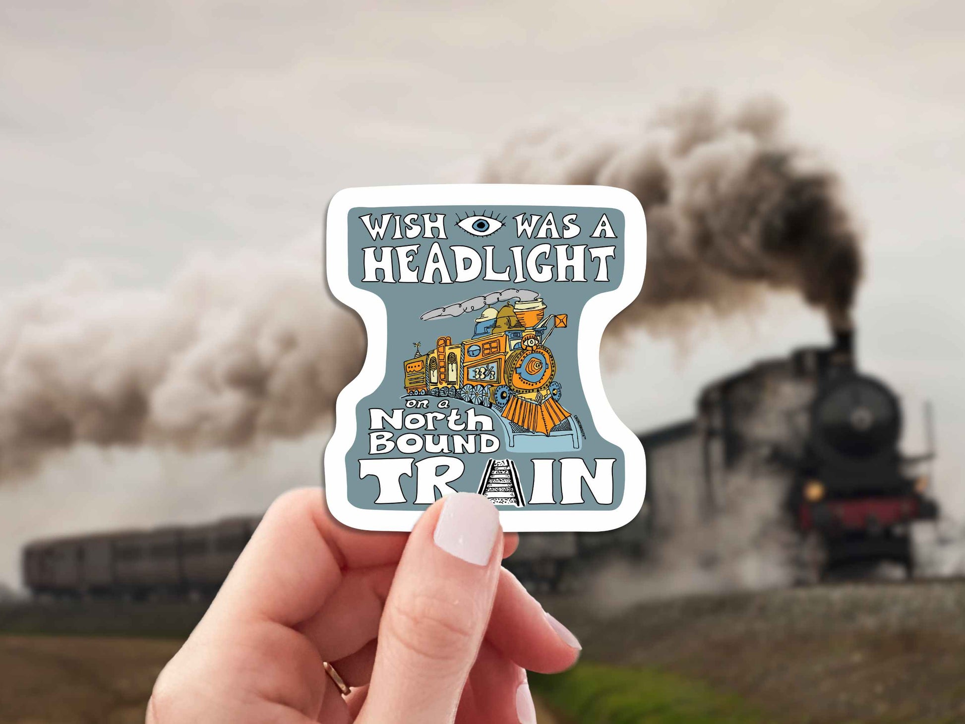 wish i was a headlight on a northbound train sticker, hand display, steam locomotive background