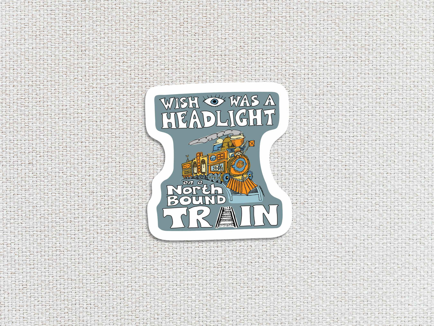 wish i was a headlight on a northbound train sticker, white textured background