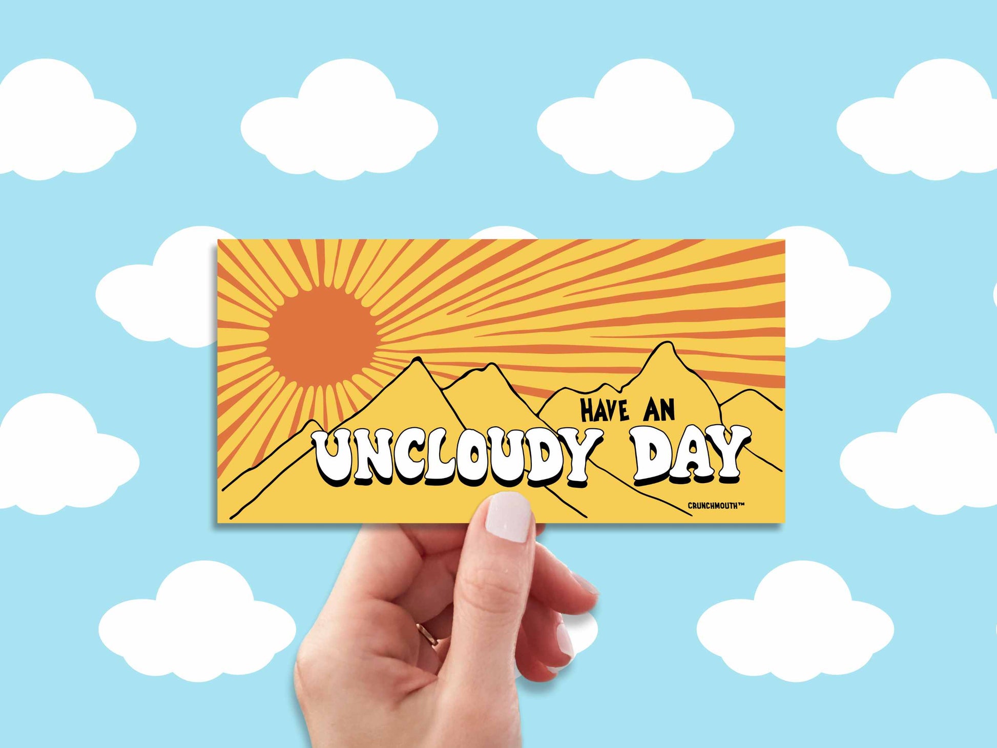 have an uncloudy day bumper sticker, hand display, cartoon cloud patter background