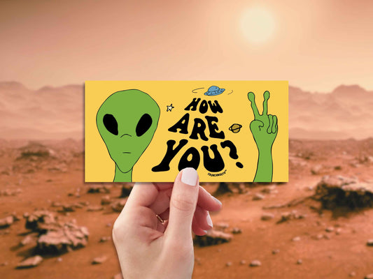 how are you? bumper sticker, green alien, martian from outer space, hand display, mars landscape background
