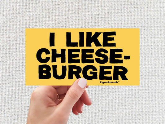 i like cheeseburger funny bumper sticker, hand display, white textured background