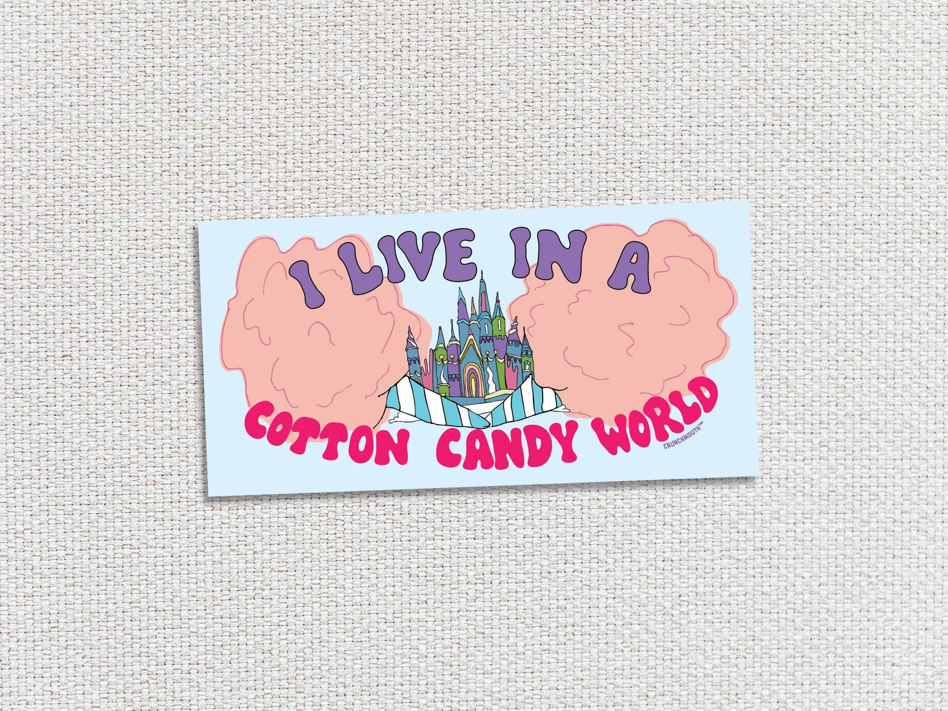 i live in a cotton candy world bumper sticker, white textured background