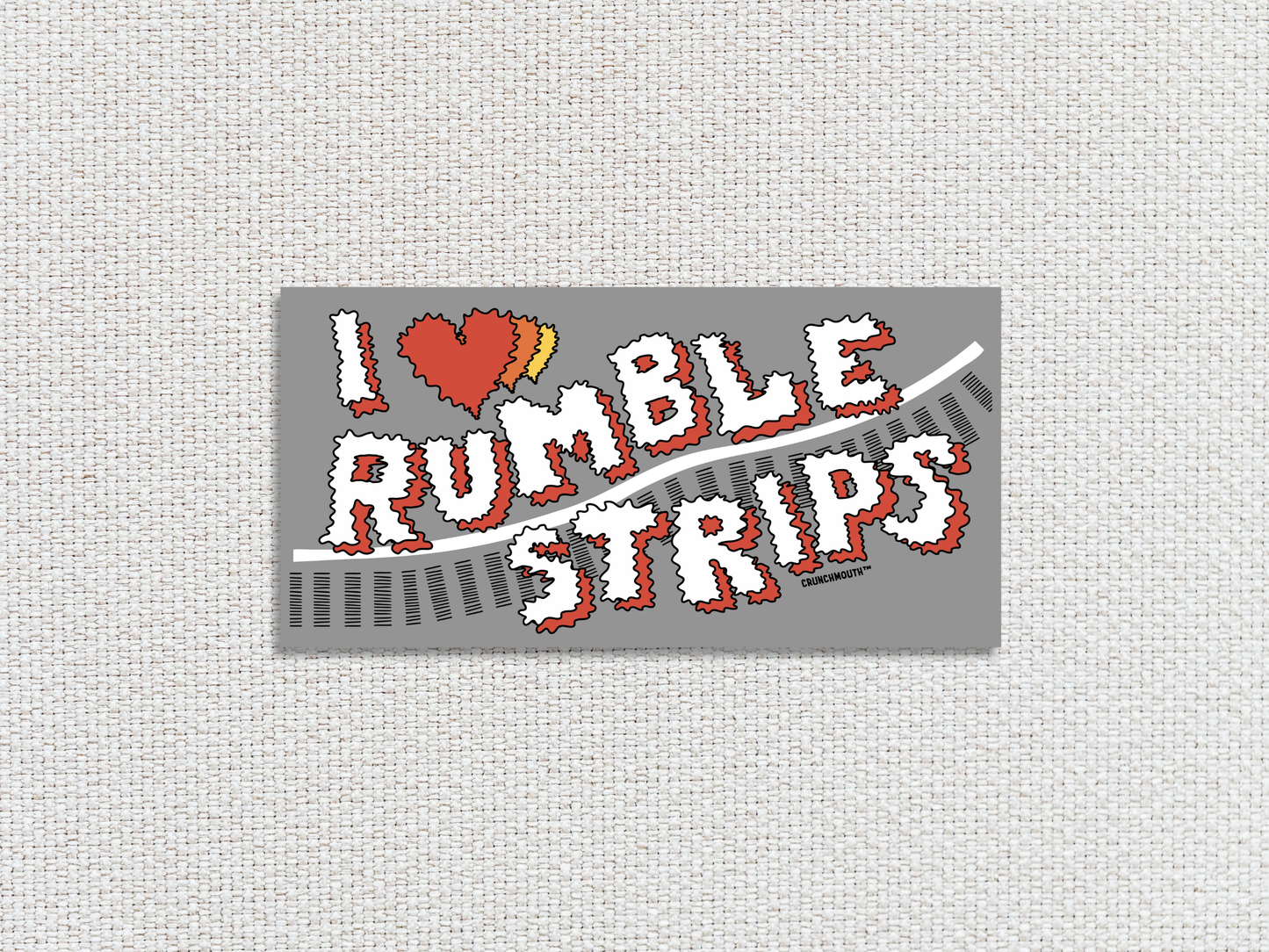 i love rumble strips bumper sticker, white textured fabric background