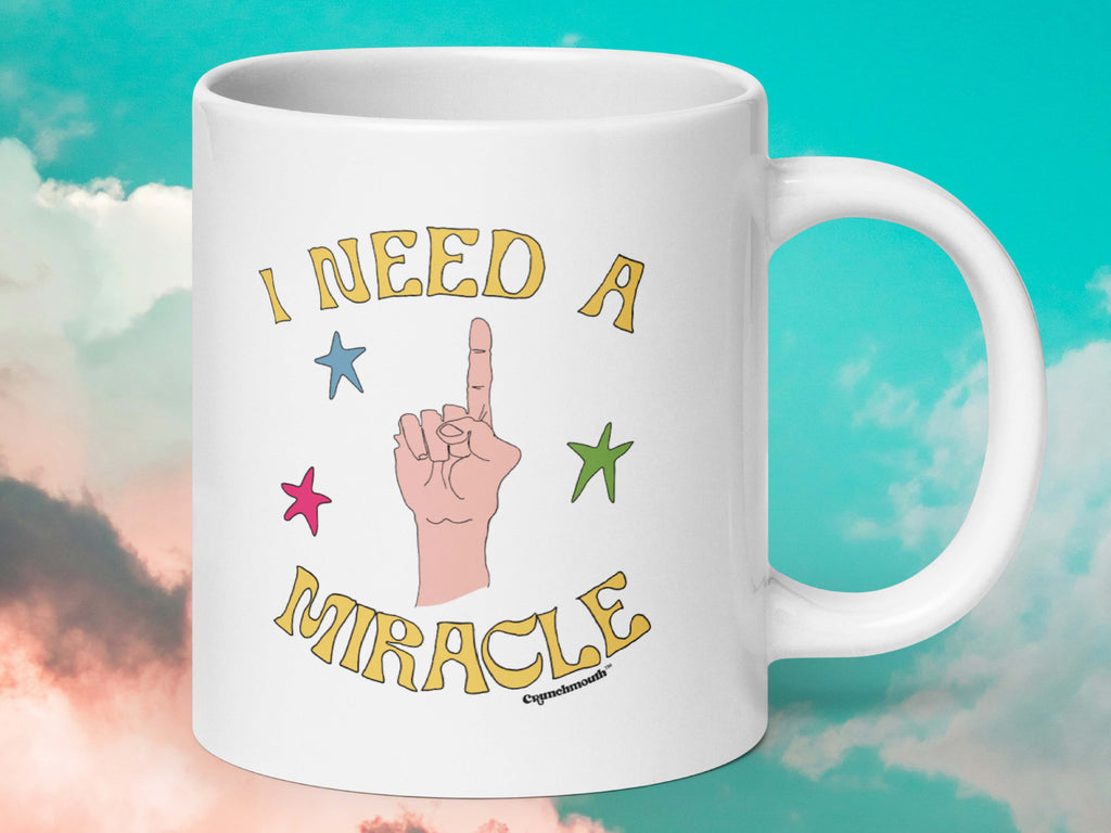 i need a miracle coffee mug, 20oz, handle on right, cloud sky background