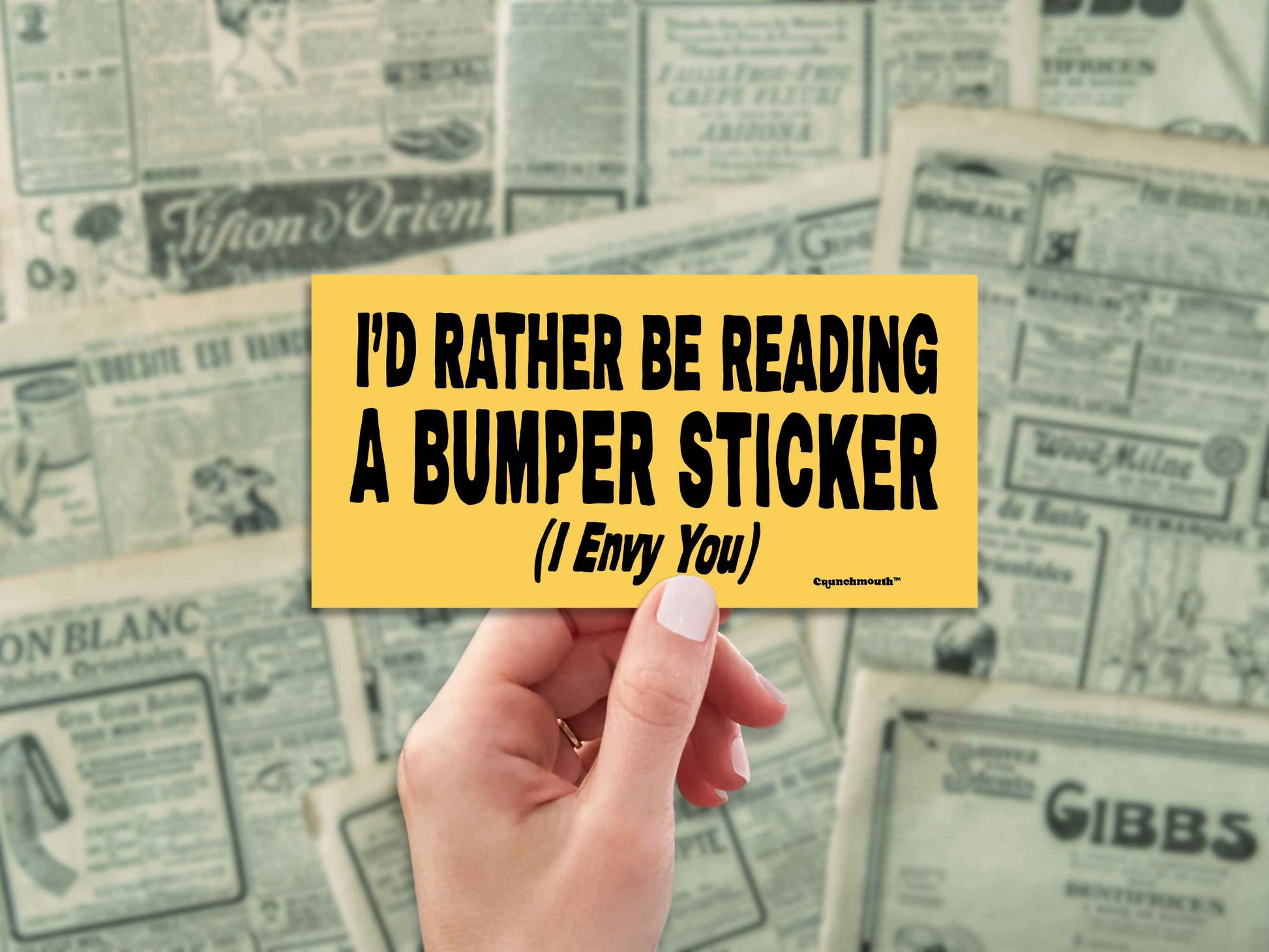 i'd rather be reading a bumper sticker (i envy you), funny bumper stickers, hand display, vintage newspaper advertisements background