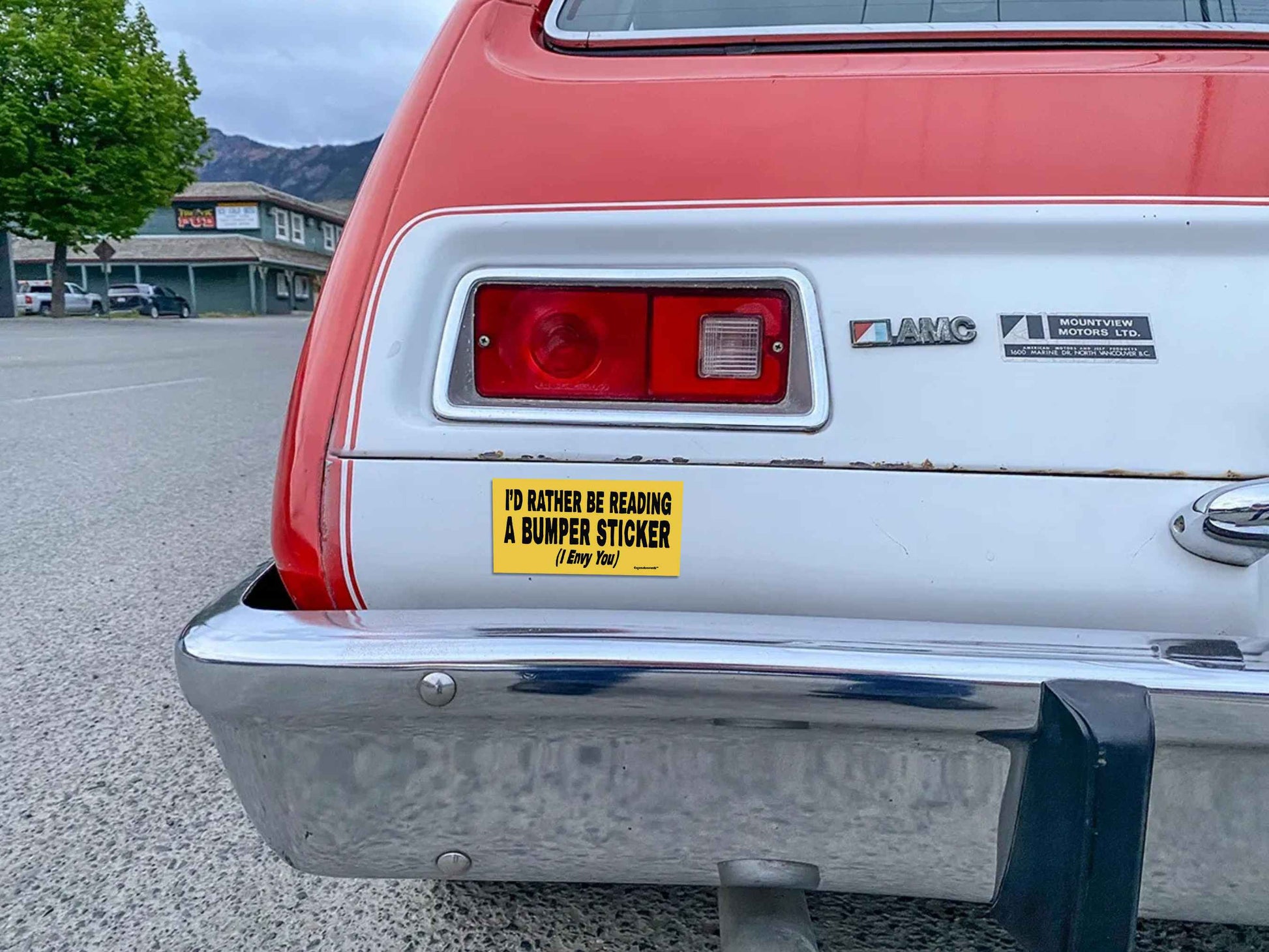 i'd rather be reading a bumper sticker (i envy you), funny bumper stickers, displayed on back of car
