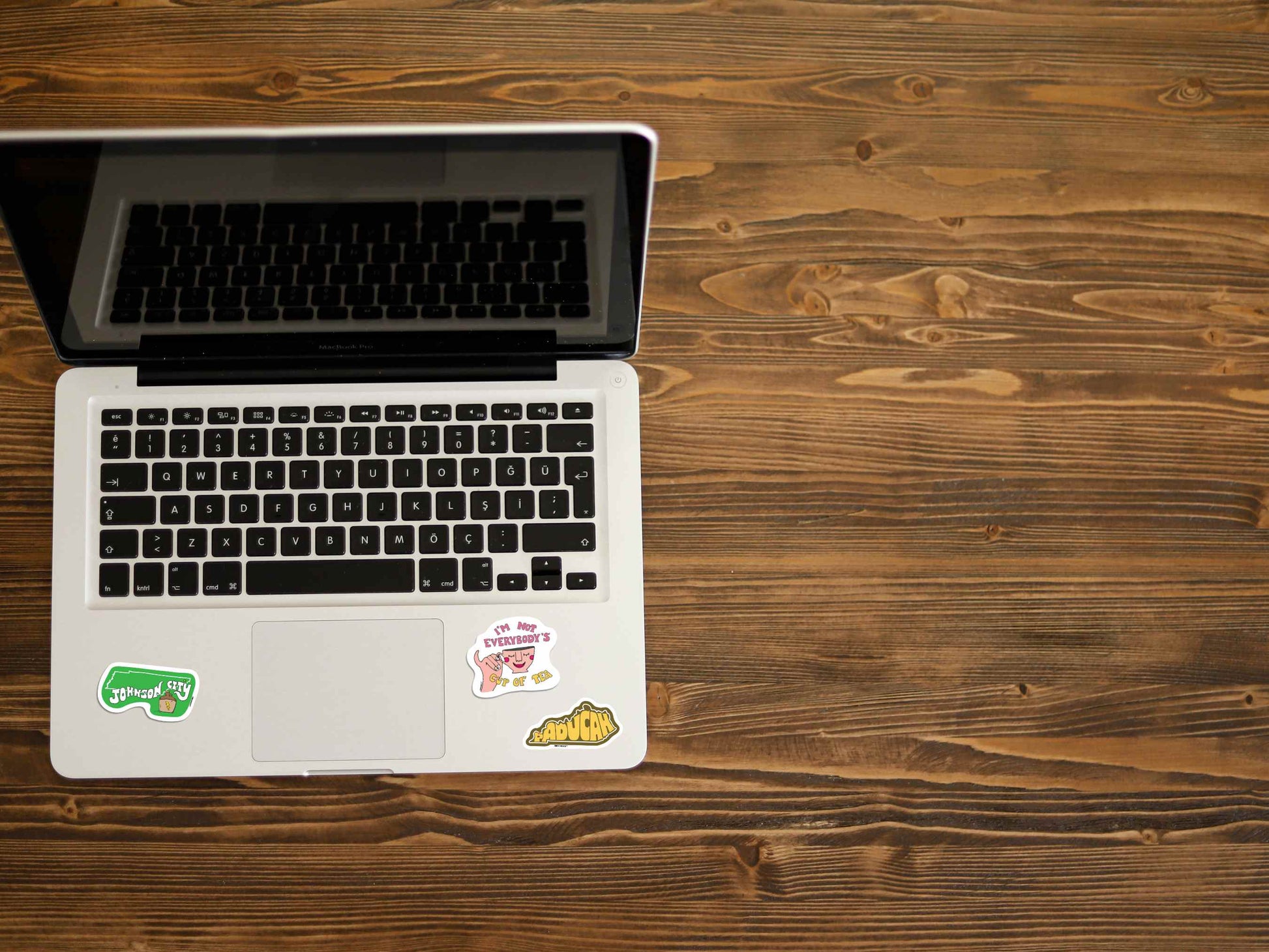 i'm not everybody's cup of tea laptop sticker, displayed on laptop