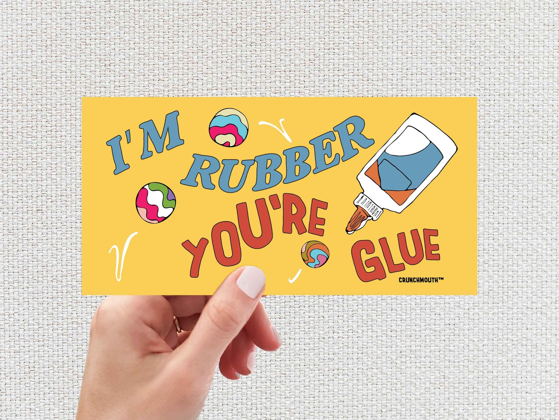 i'm rubber you're glue, funny bumper sticker, hand display, white textured background