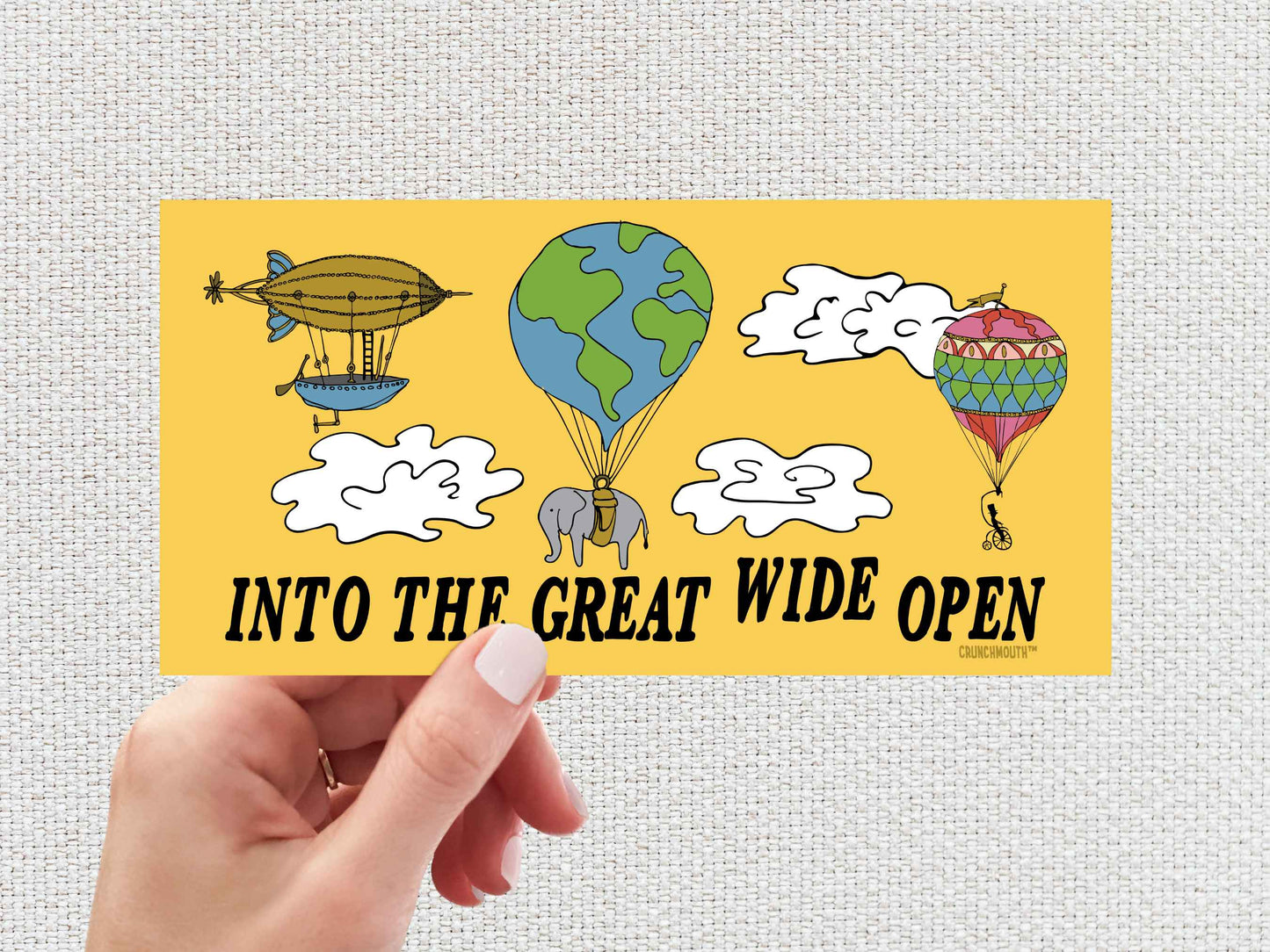 into the great wide open bumper sticker, hand display, white textured background
