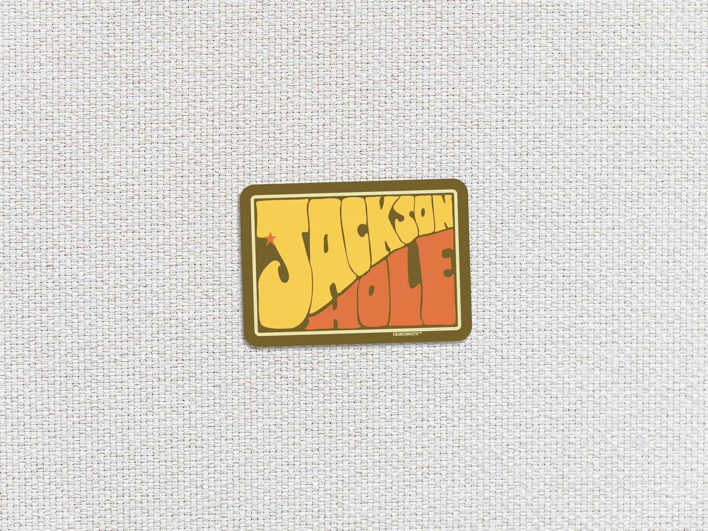 jackson hole travel luggage sticker, white textured background