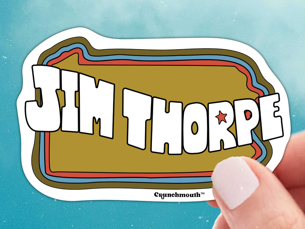 jim thorpe pennsylvania sticker, held in hand, blue sky background