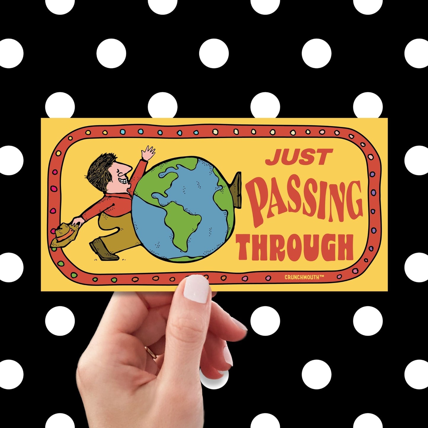 just passing through bumper sticker, hand display, polka dots background
