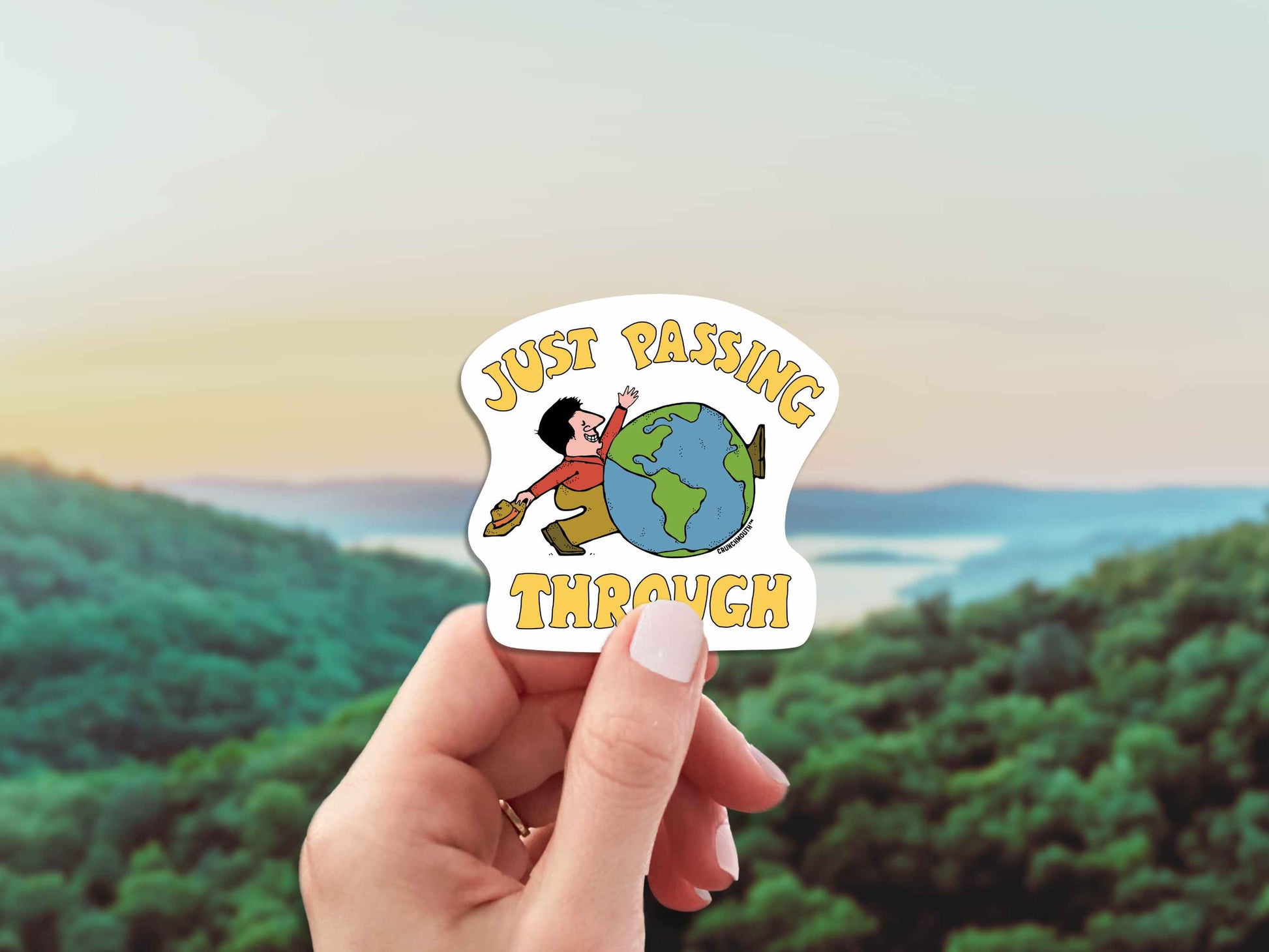 just passing through sticker, hand display, rolling hills background