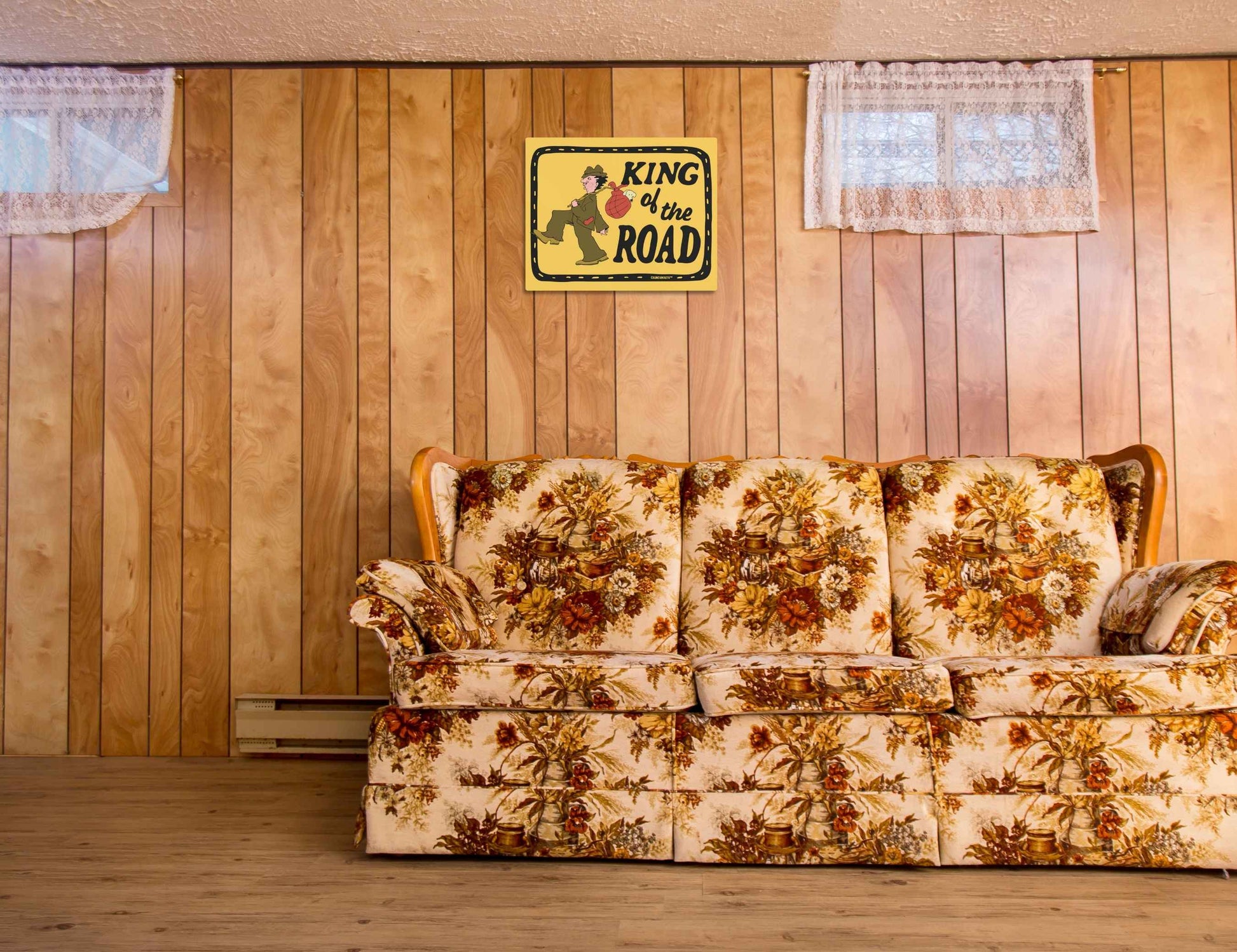 king of the road metal wall art sign, displayed in context on wall