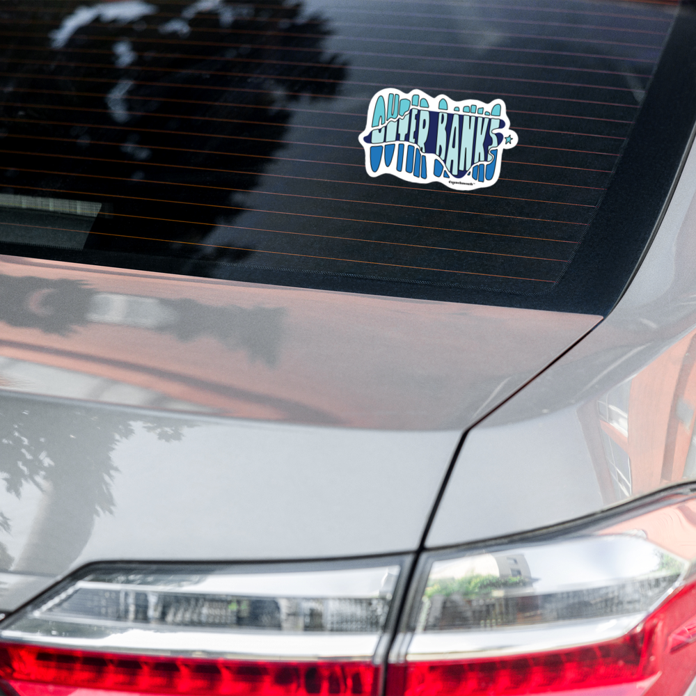 outer banks nc obx 5.5 inch vinyl decal displayed on rear windshield of car