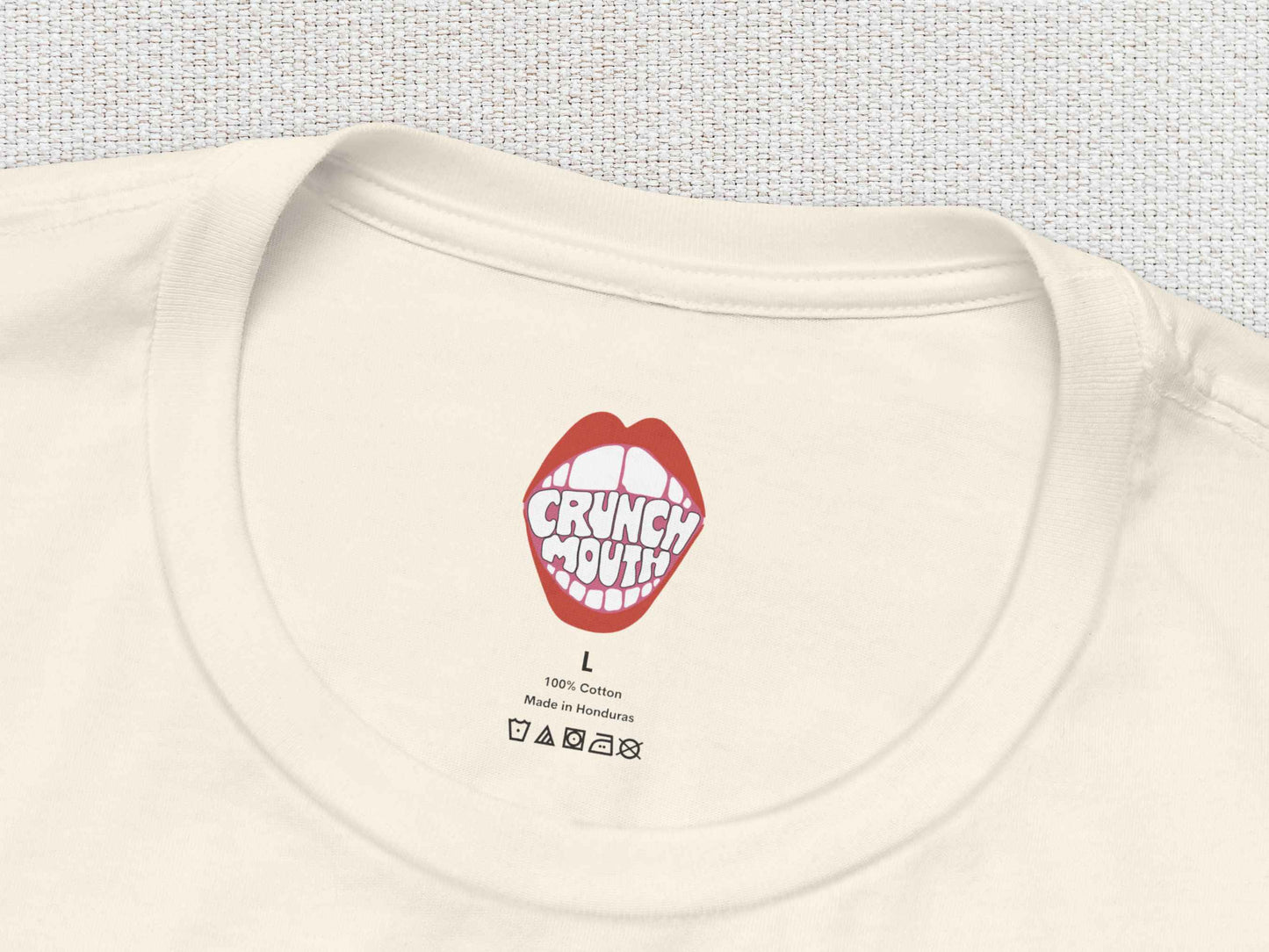 know what i mean jellybean unisex t-shirt, inner neck tag, white textured background