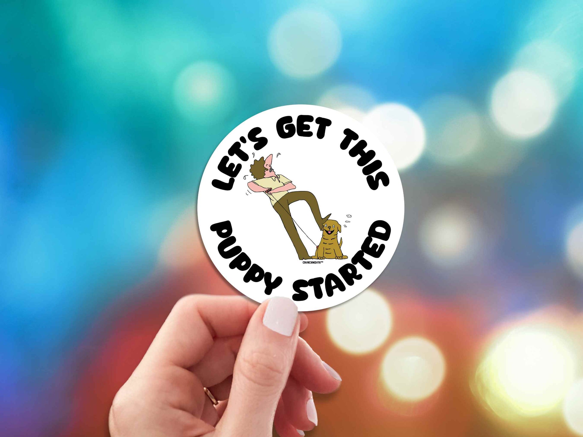 funny laptop stickers, man starting puppy like pull lawnmower, let's get this puppy started, hand display, colorful party lights background