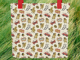 distracted squirrel tote bag, front, green grass background