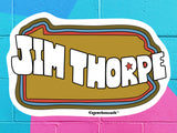 jim thorpe pennsylvania sticker, vibrant color cinder block wall background