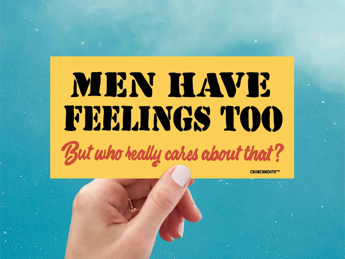 men have feelings too but who really cares about that funny bumper sticker, hand display, blue sky background
