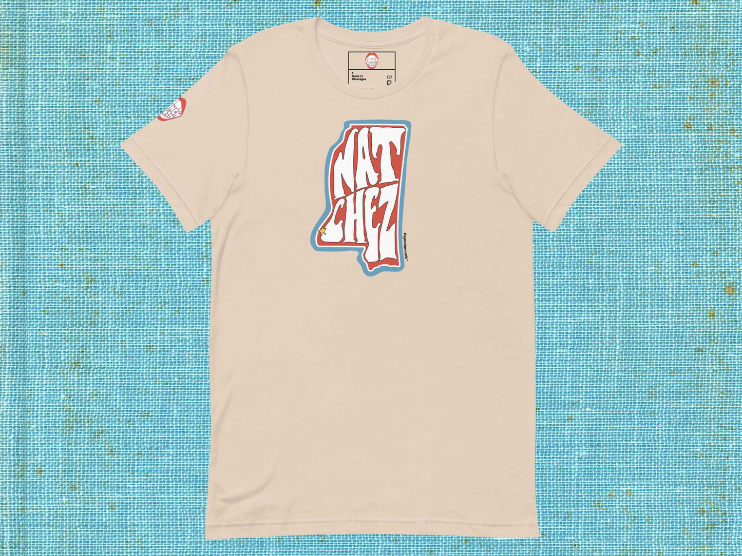natchez shirt, natchez mississippi, souvenir t shirts, flat, front, blue textured background