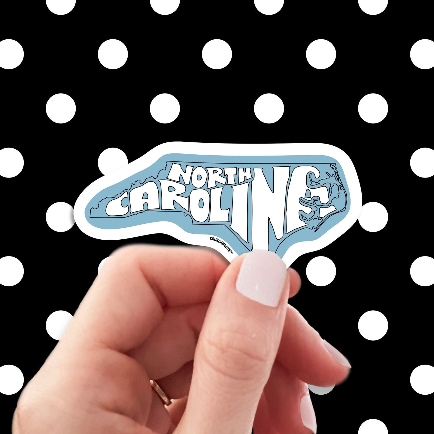 north carolina travel luggage sticker, hand display, polka dots pattern design background