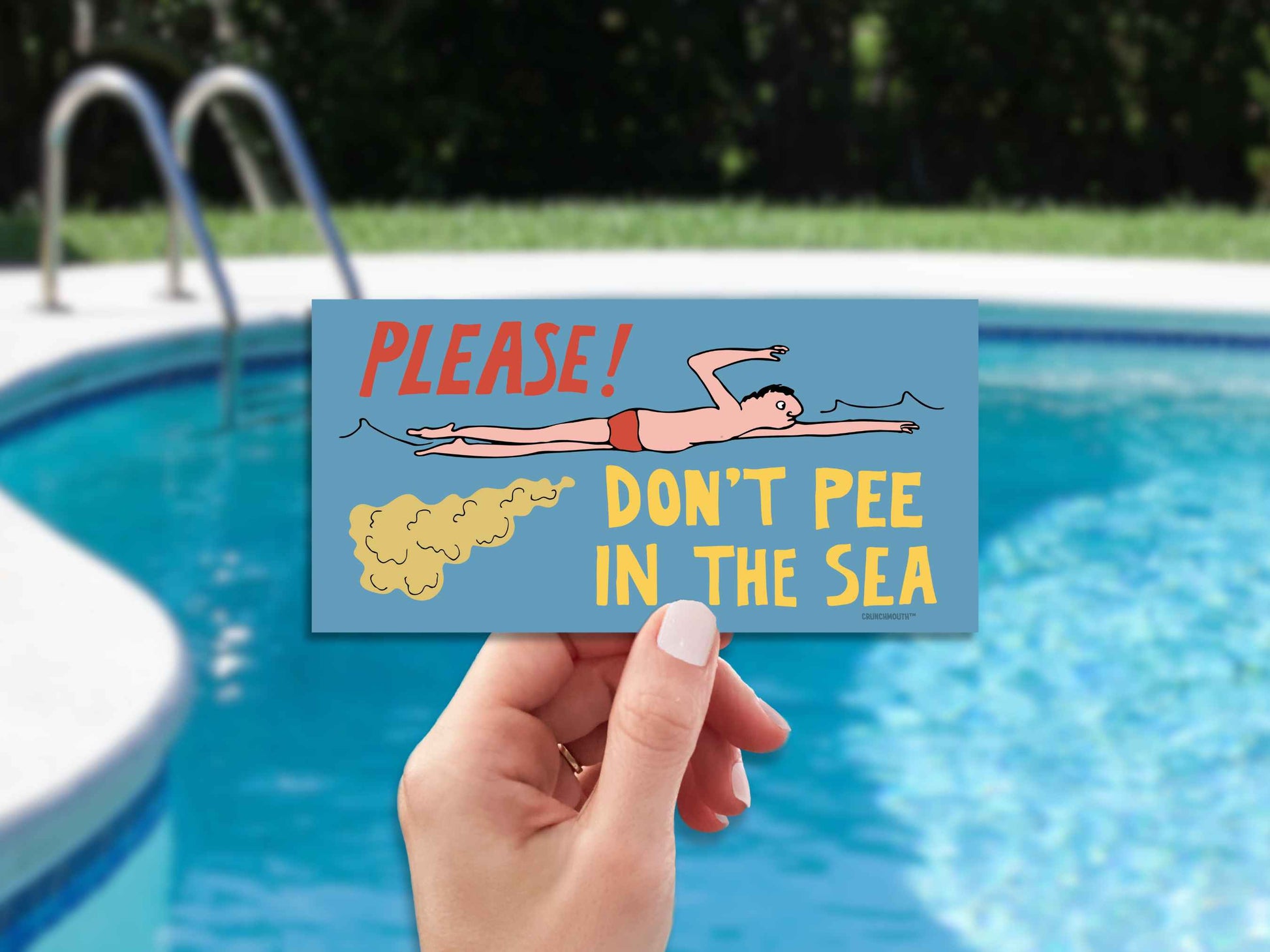 please don't pee in the sea funny bumper sticker, hand display, pool background