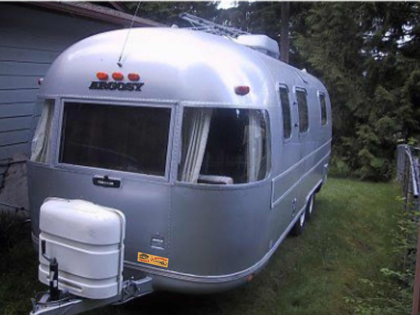 prone to wander camping bumper sticker, displayed on airstream camper