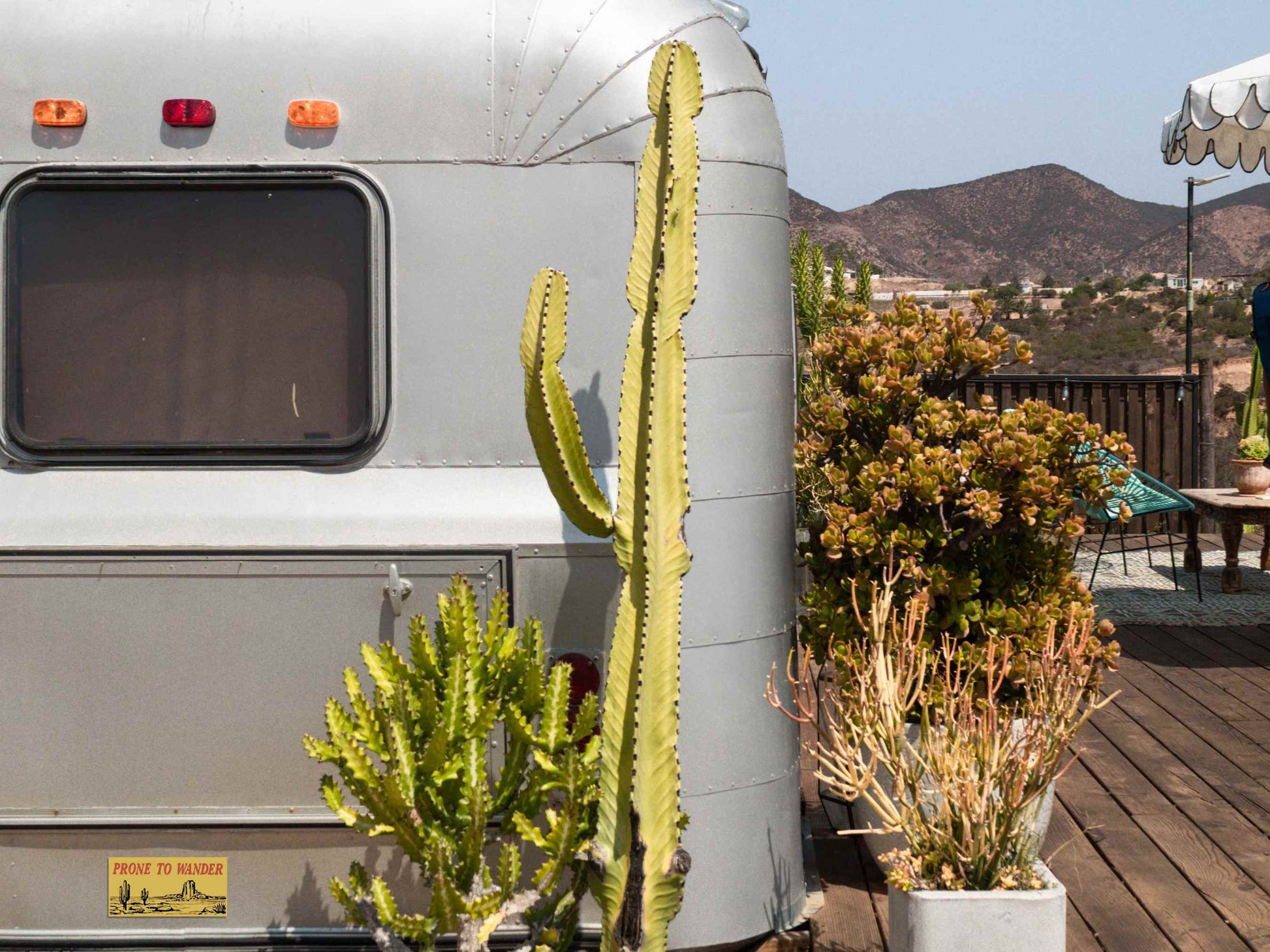 desert adventure bumper sticker, prone to wander, displayed on airstream camper