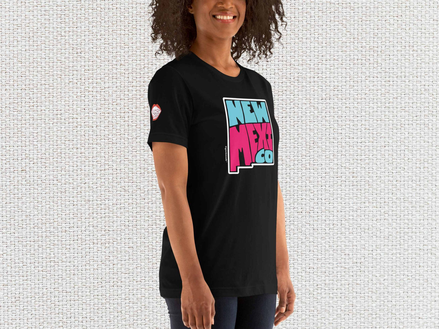 new mexico shirt, souvenir t shirts, female model, front right, white textured background
