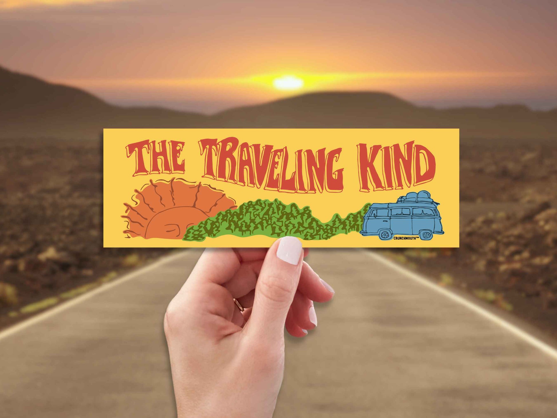the traveling kind bumper sticker, hand display, highway background