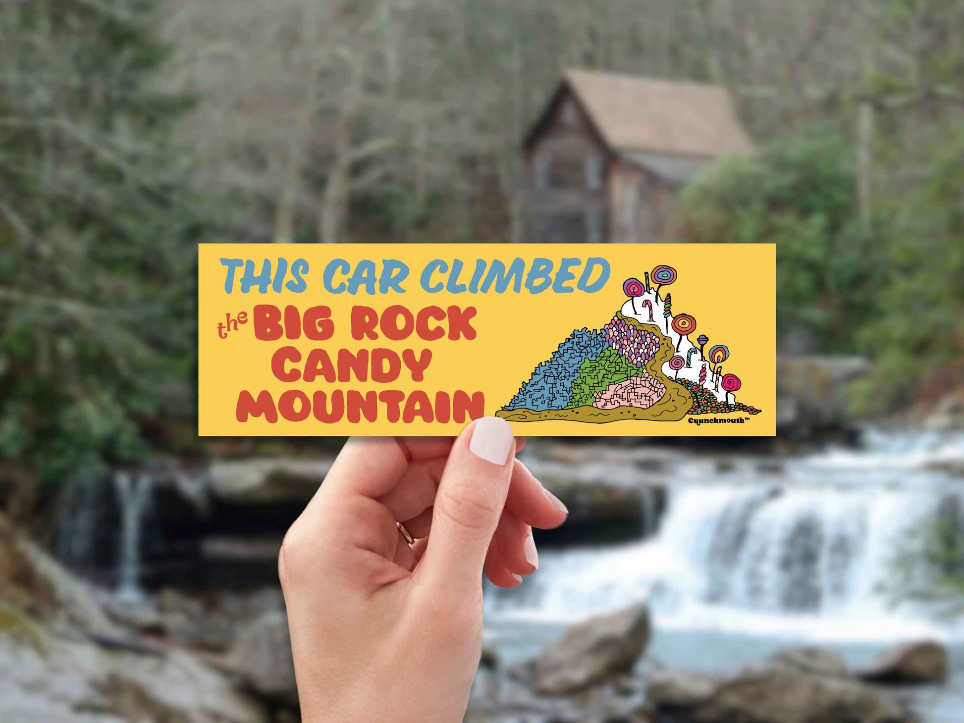 this car climbed the big rock candy mountain bumper sticker, hand display, rural appalachia background