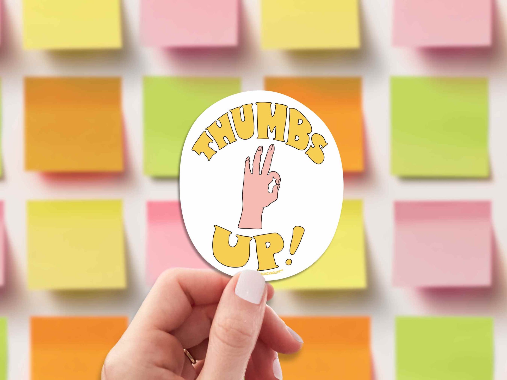 thumbs up sarcastic motivational sticker, hand display, sticky notes background