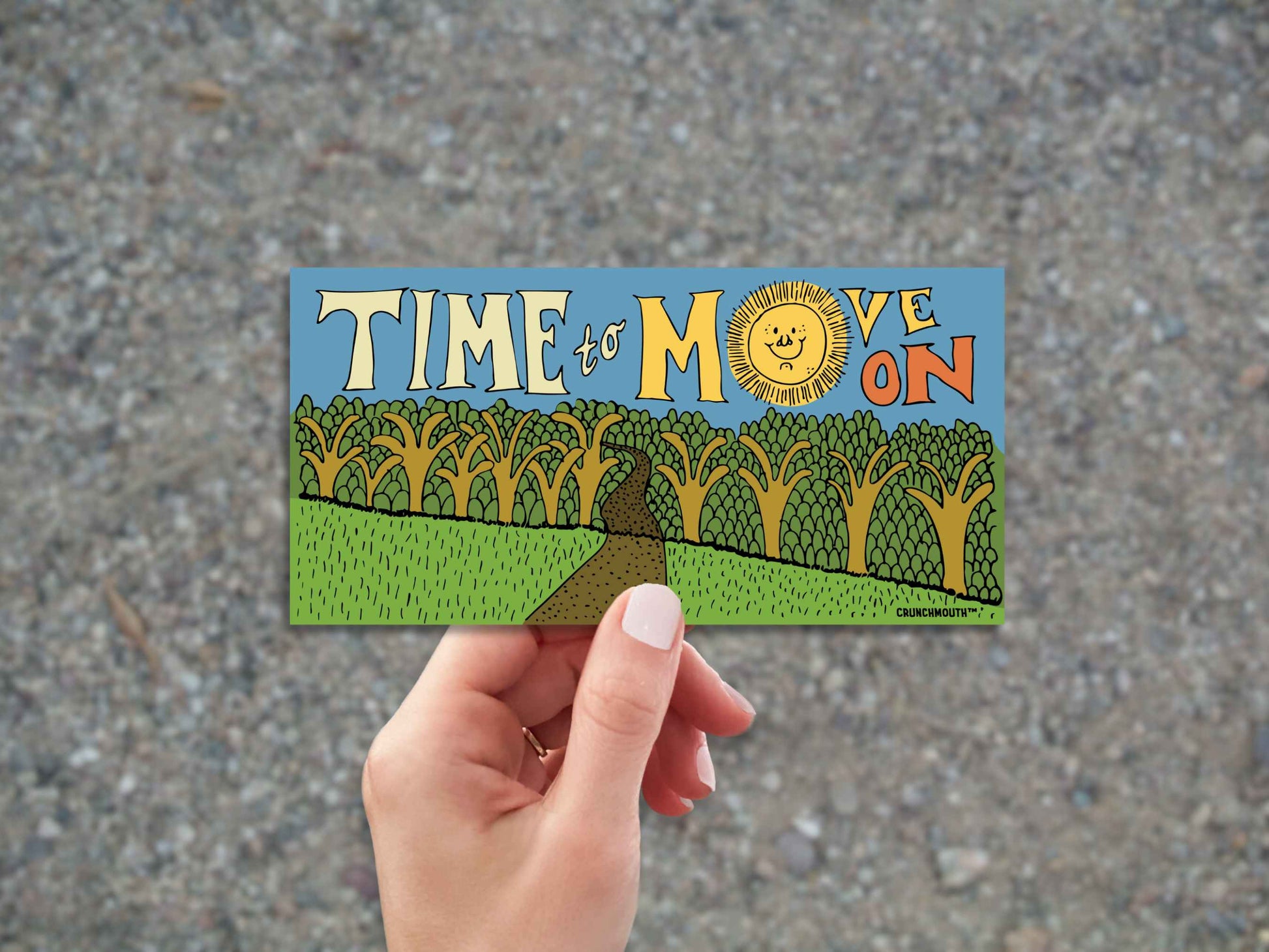 time to move on bumper sticker, hand display, gravel road background