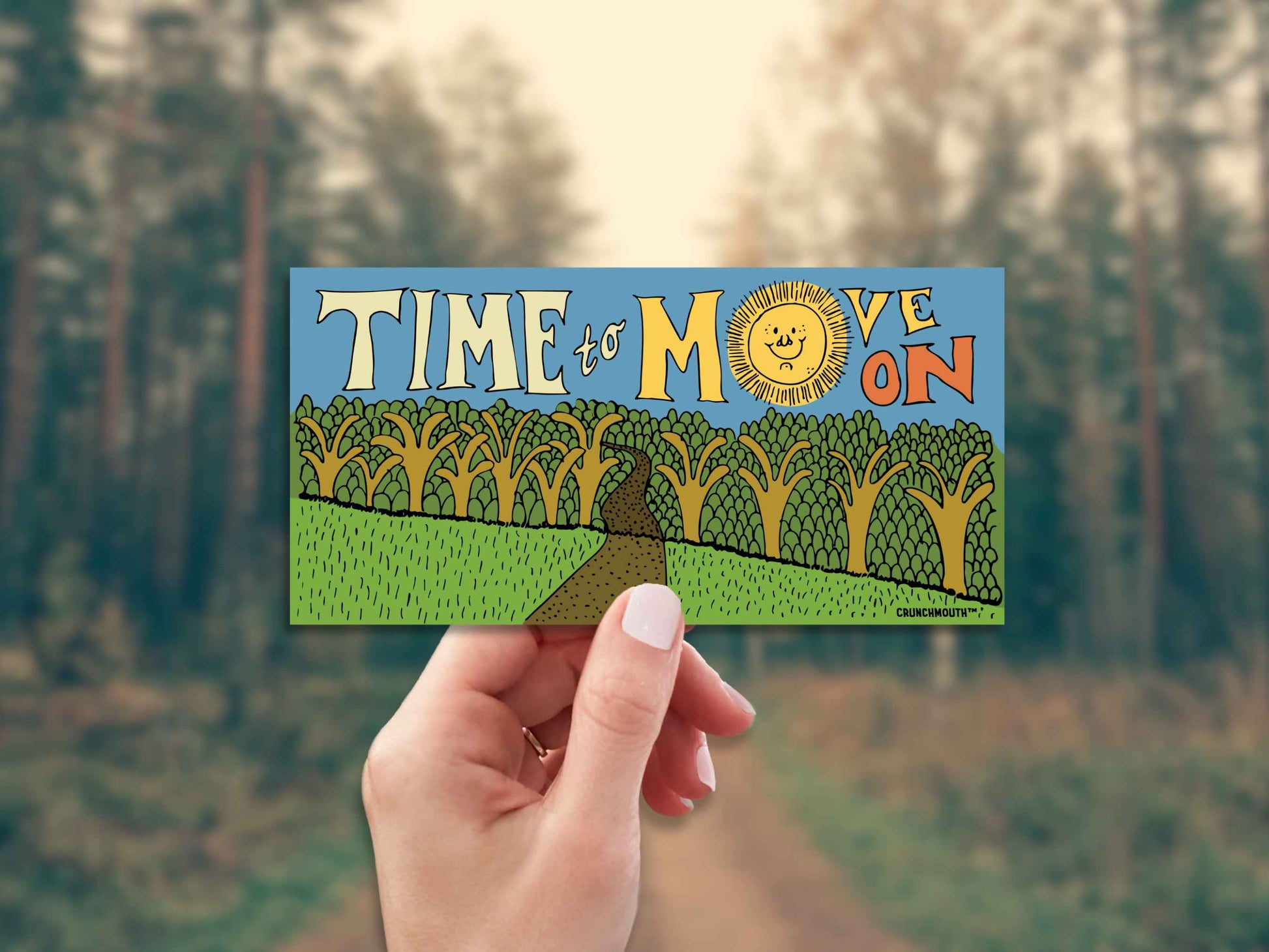 time to move on bumper sticker, hand display, dirt road background