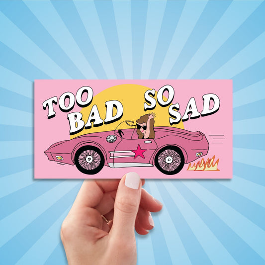too bad so sad bumper sticker, hand display, sun rays design background