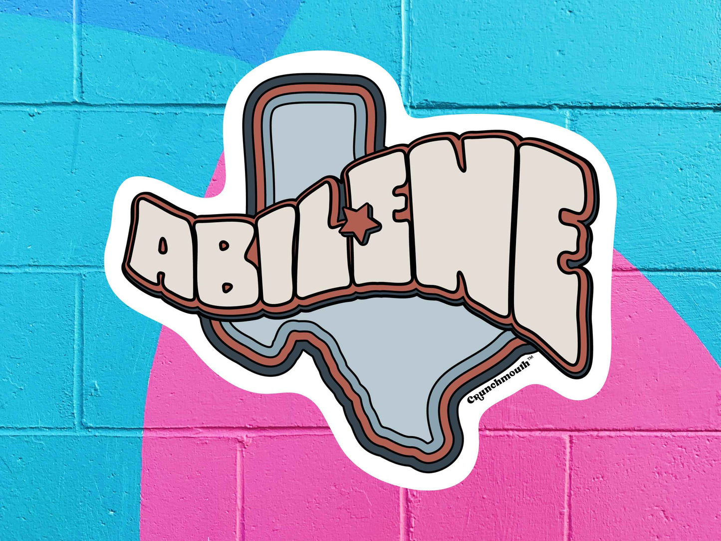 abilene sticker, travel stickers, vibrant color cinder block wall background