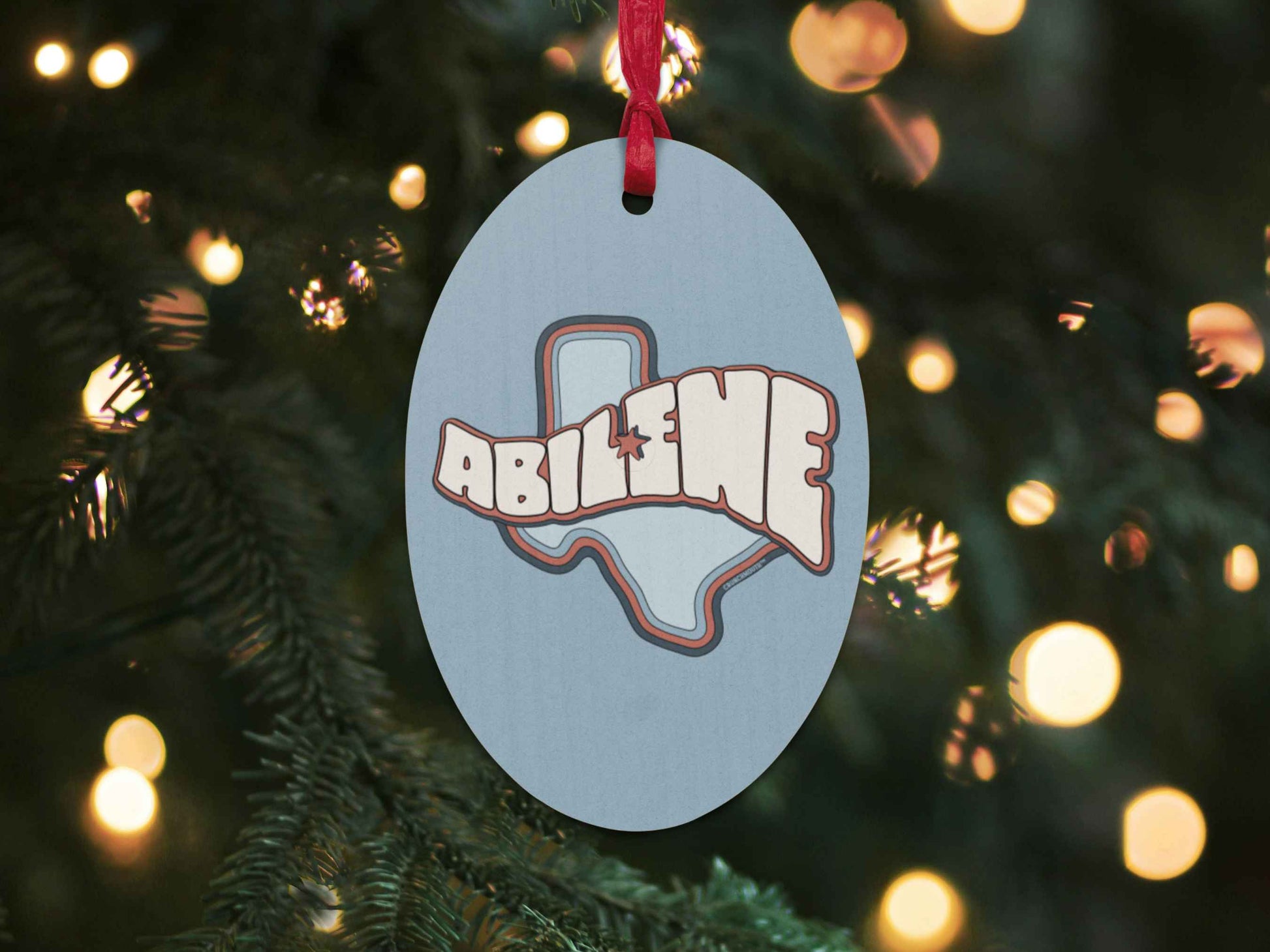 abilene Christmas ornament, back, Christmas tree background