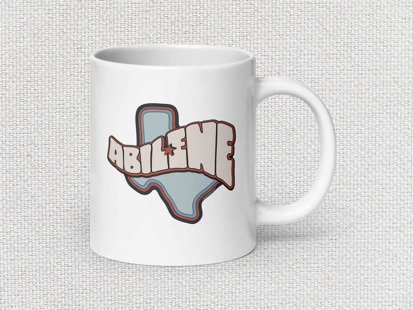 abilene coffee mug, 20oz, handle on right, white textured background